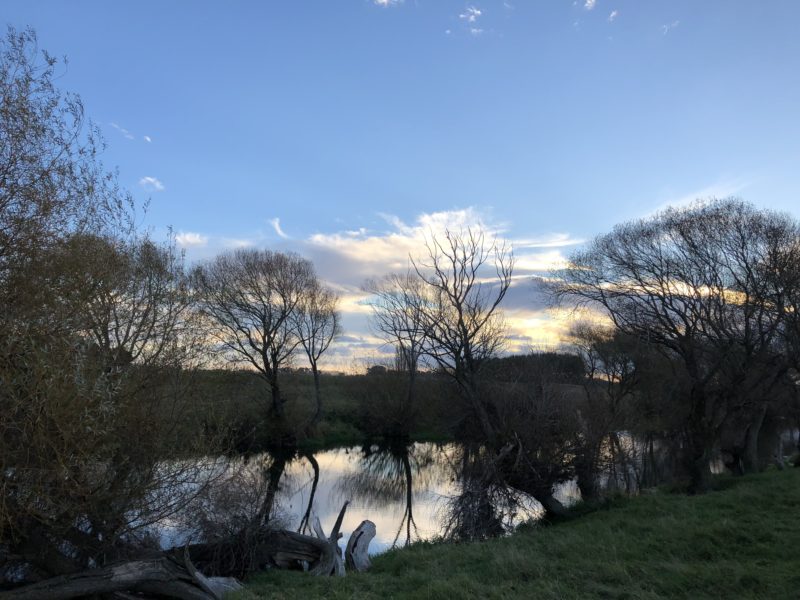 Lovely skies at dusk along the river at Selwyn Huts.